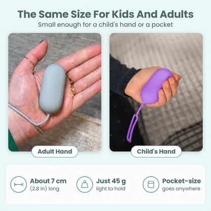 Plain blue and purple handheld relaxation devices in adult and child hands
